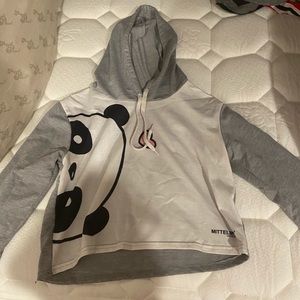 White crop top with a panda on it